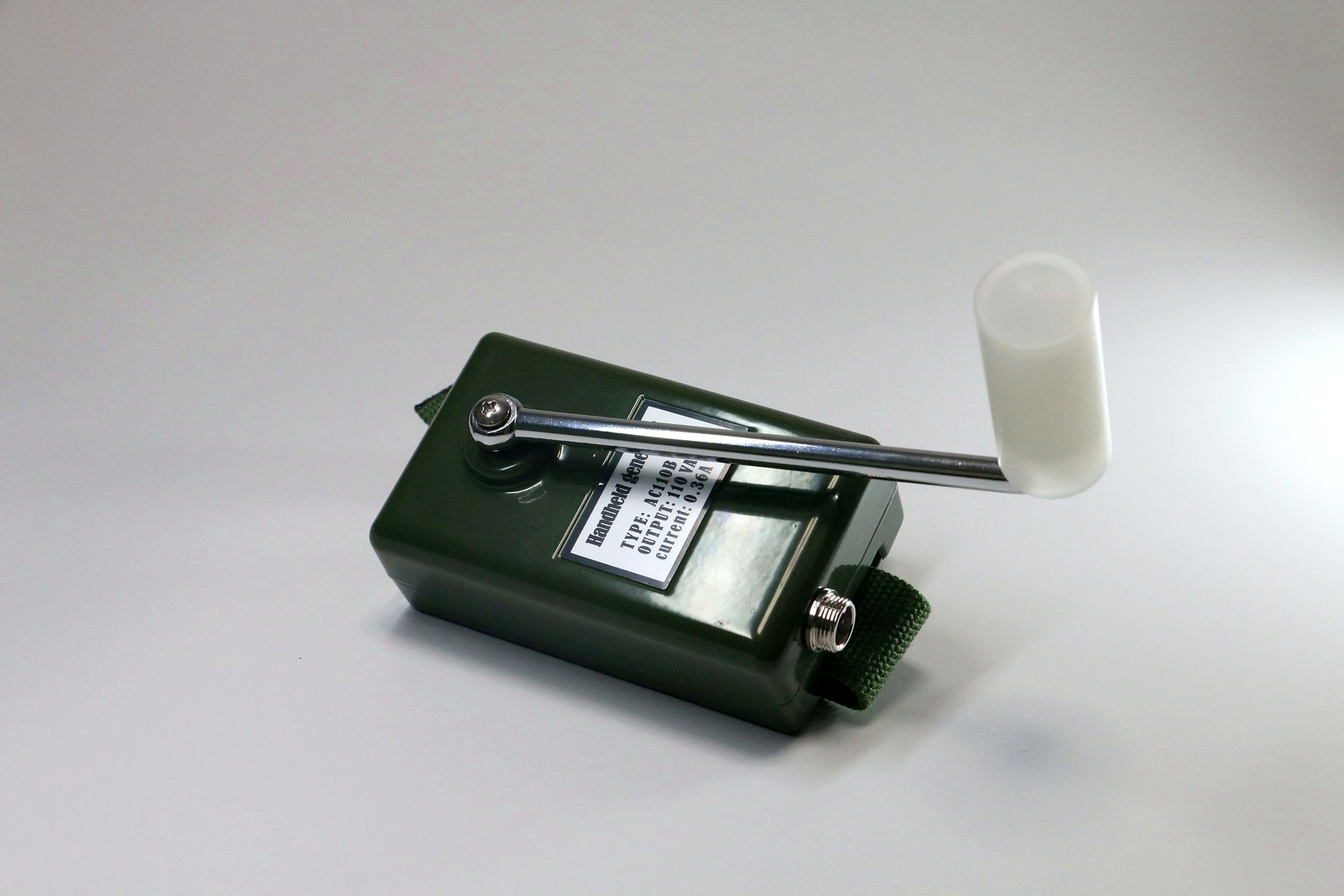 AC110B hand crank AC emergency generator on white background